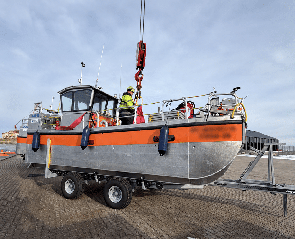 EMSA oil spill recovery vessel on a trailer on the quay