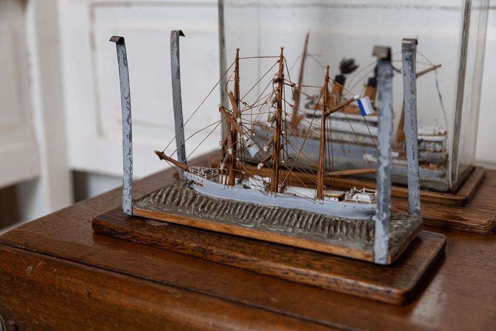 Model of a sailing ship on a wooden base