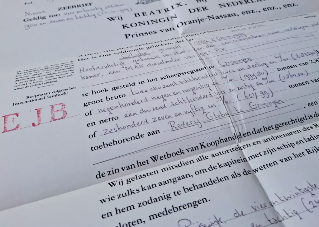 Detail of the 1983 Zeebrief text with the port of registry Groningen, the tonnage and the owner