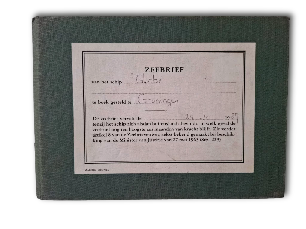 Green linen cover of the 1983 Zeebrief with a handwritten label: ship Globe, port of registry Groningen